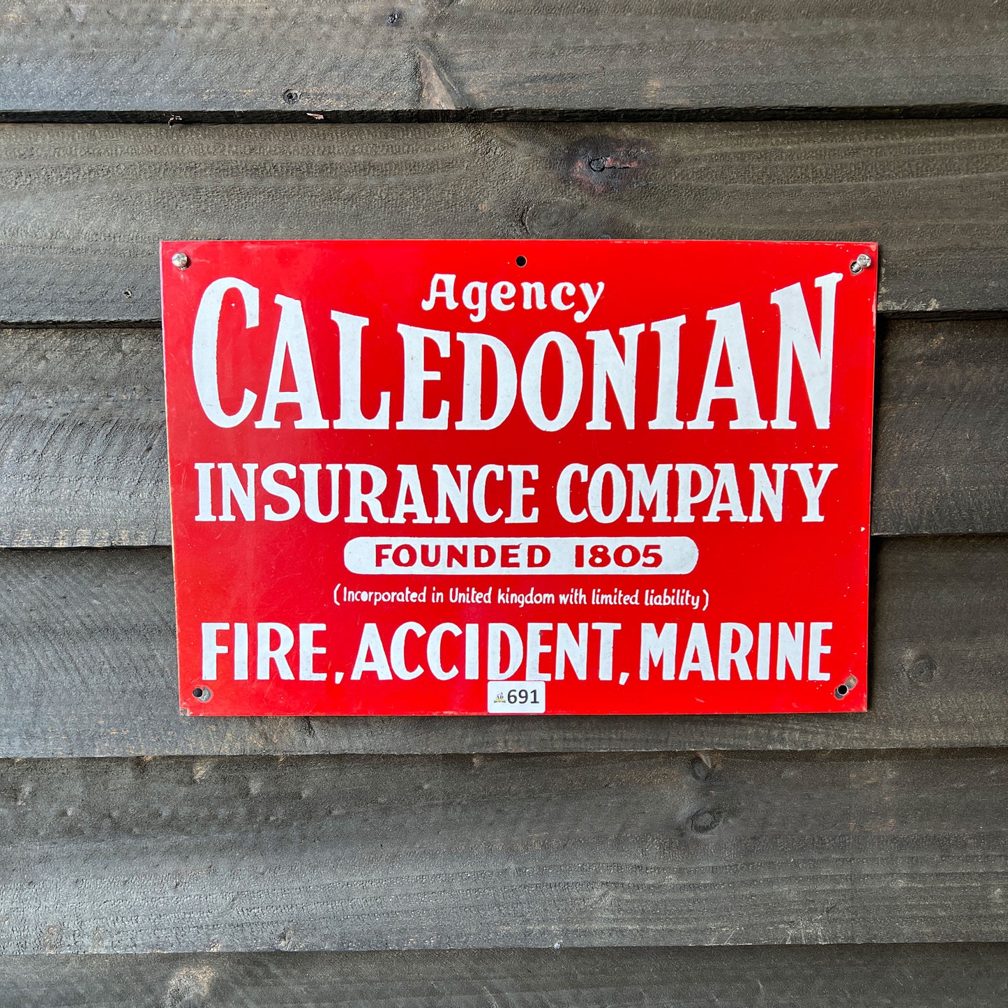 Caledonia Insurance Company Enamel Sign
